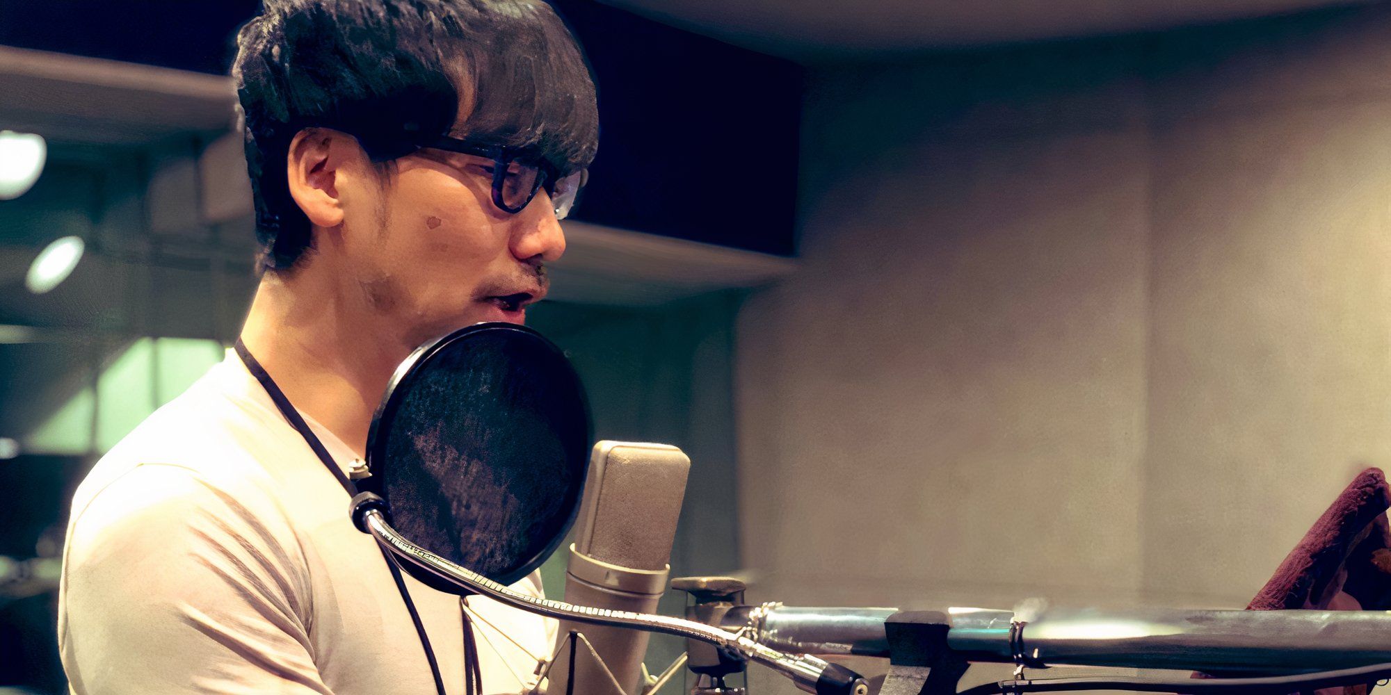 kojima in a voice recording booth 